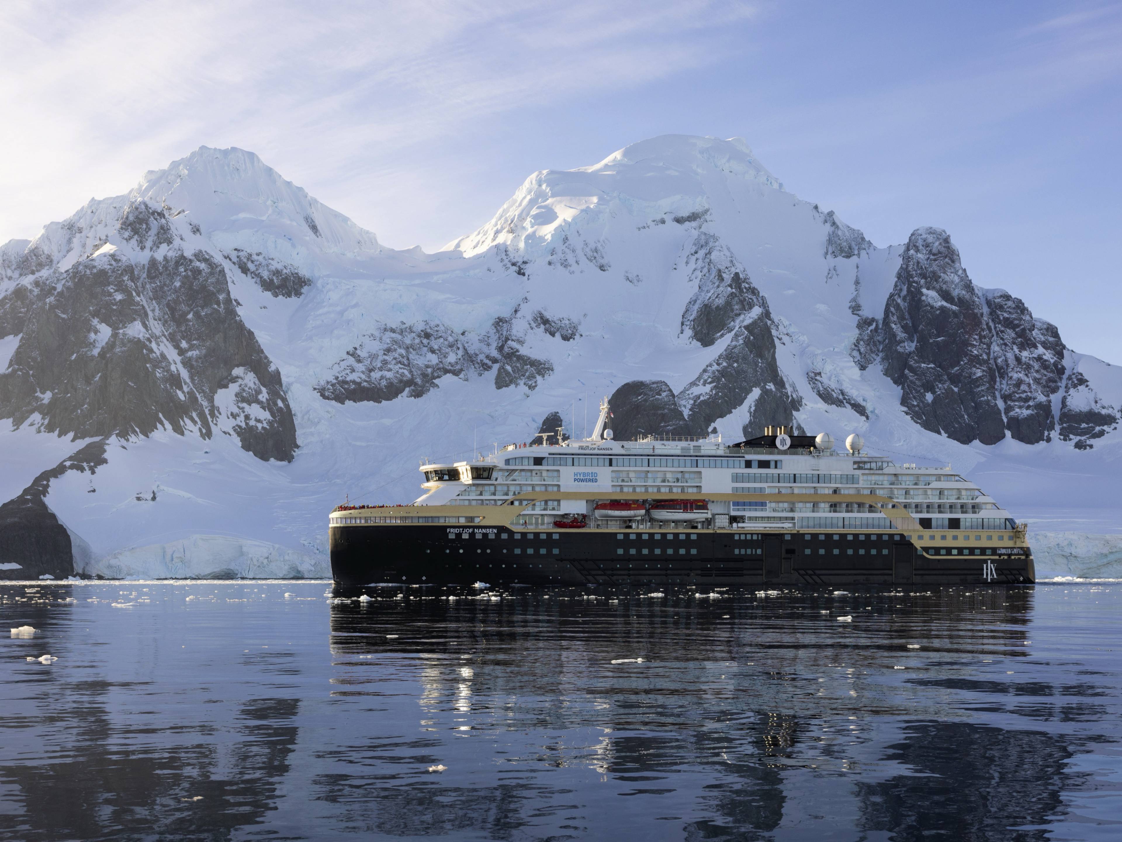 https://yachtcruisecompany.com/imagecache/fit/uploads/2025/12/hx-expeditions-antarctica-lemaire-channel-ms-fridtjof-nans-espen-mills.jpg?size=4x3-4k